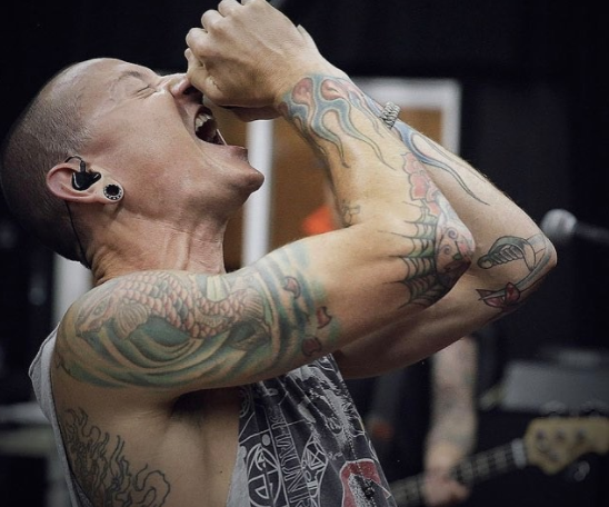 Tattoo, Arm, Flesh, Human, Human body, Hand, Muscle, Elbow, Performance, Barechested, 