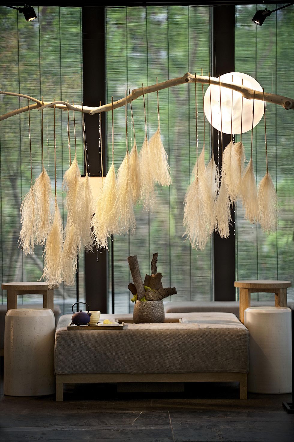 Feather, Room, Yellow, Interior design, Lighting, Wall, Furniture, Tree, Lighting accessory, Lampshade, 