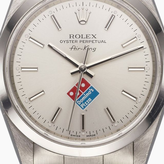 gift terrorist journalist Why Is There a Domino's Logo on This Rolex?