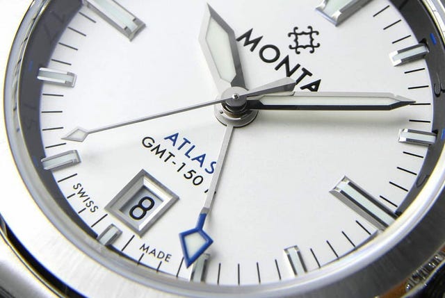 white gmt watch dial close up