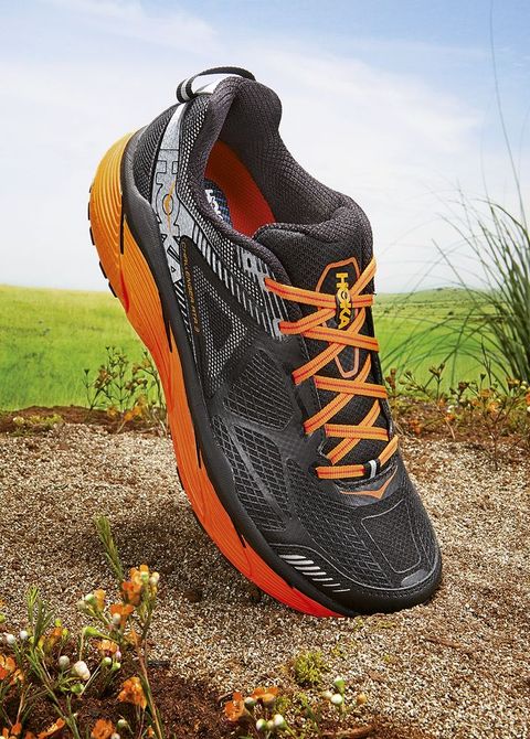 Footwear, Shoe, Orange, Grass, Leaf, Outdoor shoe, Athletic shoe, Plant, Hiking boot, Running, 