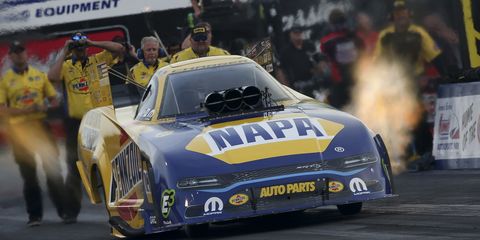 Ron Capps raced&nbsp;to the top of the Funny Car chart on Friday at Norwalk, Ohio.