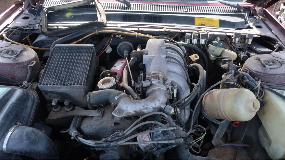 Sadly, this turbocharged engine is bolted to an automatic transmission.
