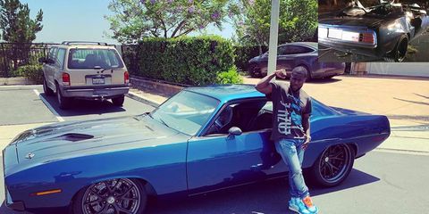 Kevin Hart posing with his then-new Speedkore Barracuda.
