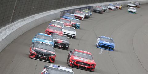 <span id="CT_Main_1_cache_lblCaption">Austin Dillon leads a pack of cars during the Monster Energy NASCAR Cup Series FireKeepers Casino 400 at Michigan International Speedway.</span>