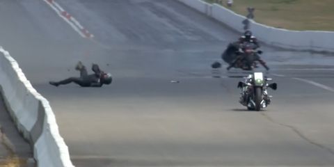 Beau Layne hit the opposite-lane guard wall and flew from his motorcycle immediately after registering a speed of 215.86 mph in his first qualifying attempt.
