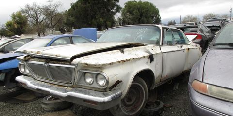 Chrysler's big, powerful luxury hardtop sedan for 1964, now discarded in a Silicon Valley wrecking yard.