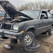 The Chevrolet Chevette had a little-known Pontiac-badged twin, known as the T1000 or 1000. Here's one in a Denver junkyard.