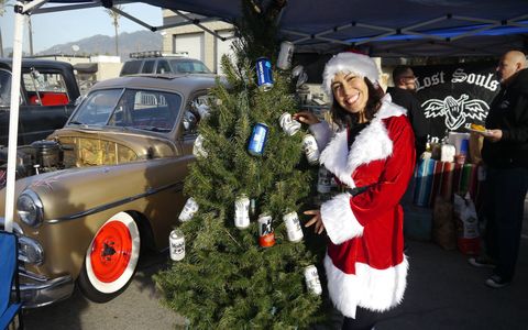How do you know it's Christmas in SoCal? When you see the long lines around Irwindale for the Mooneyes X-mas Party Show & Drag! Ho ho ho! It's a huge car show with hundreds of lead sleds, bombs, rat rods and kustoms, and this year exactly 100 race cars showed up for the 1/8-mile drags! They put the X in X-mas!
