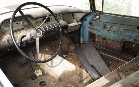 The car appears to have been stripped for painting, but the project was never finished. Most of the interior is long gone.