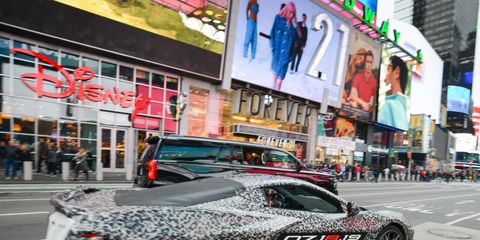 Here are the first official photos of the C8 Corvette, still camouflaged, being driven through New York with Corvette chief engineer Tadge Juechter at the wheel and GM ceo Mary Barra riding shotgun. Look for the official C8 reveal July 18.
