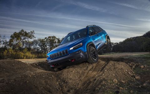 The 2019 Jeep Cherokee gets about half a complete makeover, including a more mainstream grille and a new turbo four, all while remaining just as confident off-road. Look at that left rear tire!