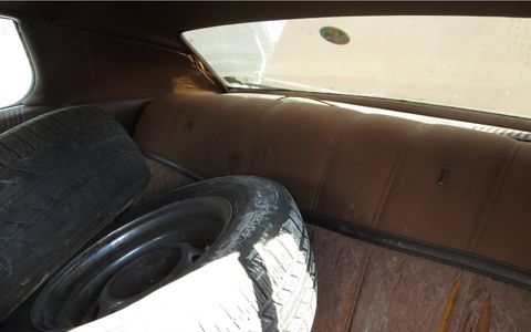 The interior hadn't been luxurious for decades, but you can see hints of its former cloth-and-vinyl glory.