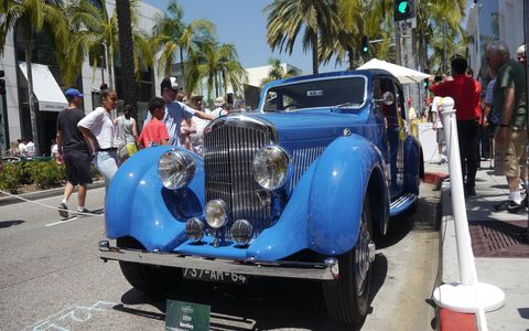 The 24th annual Rodeo Drive Concours d'Elegance was held under perfectly Beverly Hills blue skies on four blocks of the world's best shopping street. With over 100 cars and probably 20,000 people it is the single biggest event that happens in the city all year. And it's free! Happy Fathers' Day!