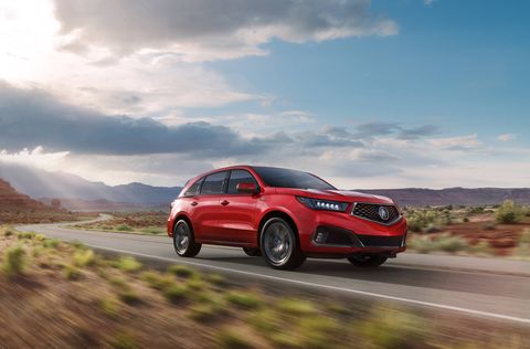 The 2019 Acura MDX midsize crossover is on sale now, and the big news -- alongside transmission refinements and the rollout of standard start-stop -- is the addition of the A-Spec trim. It adds 20-inch aluminum alloy wheels, a unique front fascia, larger-looking exhaust outlets and more, plus a variety of sport-oriented interior features. A-Spec trim is shown.