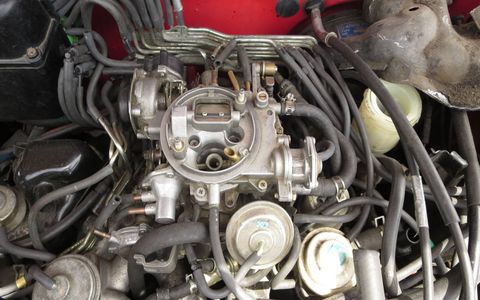In the CVCC system, the carburetor fed a lean fuel mix to the main combustion chambers and a rich mix into the small pre-combustion chambers where the spark plugs lived.