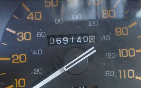 The car seems way too beat-up for this low odometer figure, but there it is.