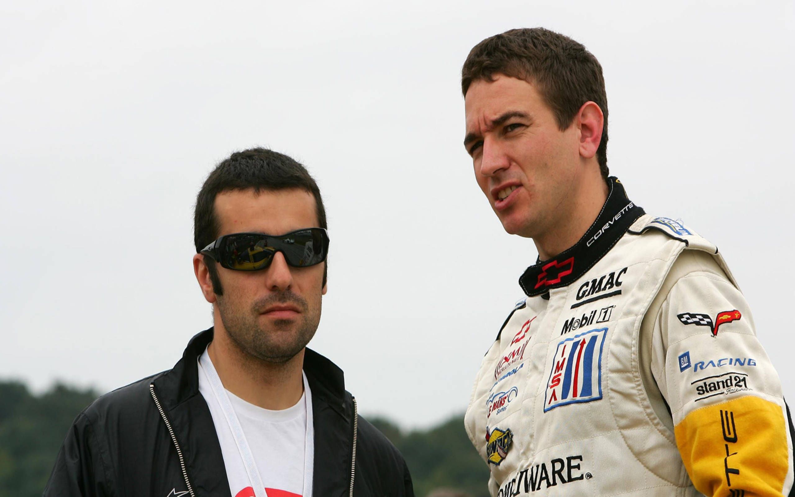 Dario Franchitti, left, visits with Oliver Gavin on the Petit Le Mans grid in 2005. Gavin has five Petit Le Mans victories.