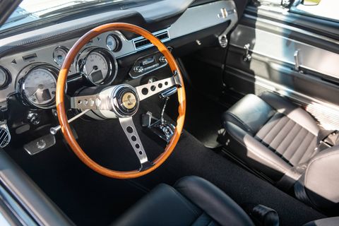 Revology makes up the replica Mustangs with period-correct interiors.