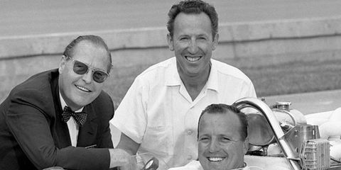 George Bignotti, pictured here behind driver A.J. Foyt, helped tune cars for seven Indy 500 winners.