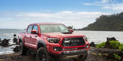 TOYOTA TACOMA -- The Toyota Tacoma  has been the sales champ of the midsize segment so far this year. The base truck starts at $27,425, while the top dog checks in at $46,410. The TRD Pro Tacoma comes equipped with the 3.5-liter V6 engine, part-time four-wheel drive, special Fox internal-bypass shocks, a stainless cat-back exhaust and 16-inch black alloy wheels with Goodyear Kevlar-reinforced tires.