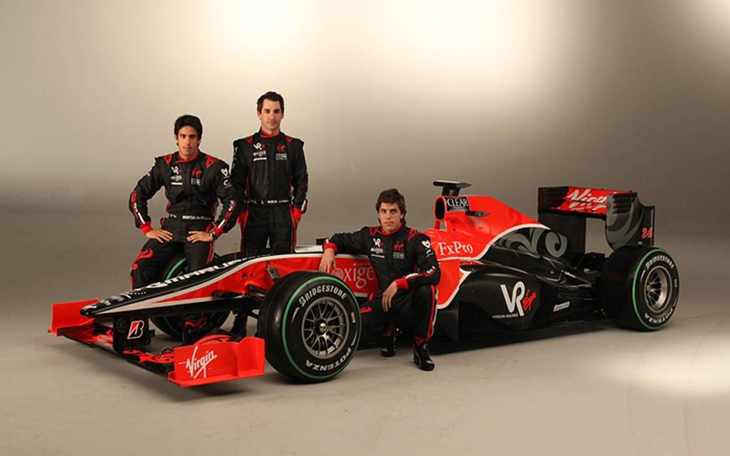Команда формулы 1 8. Болид ф1 2010. Болиды ф1 Вирджин. Marussia Virgin f1. Вёрджин (команда «формулы-1»).