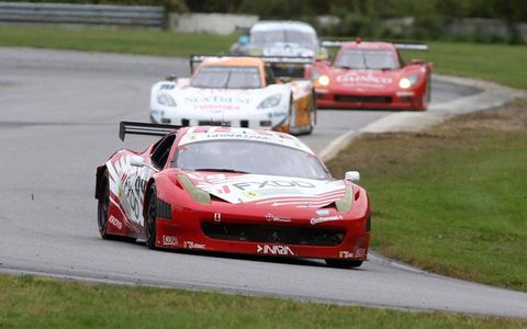 2012 Grand Am at Lime Rock: The #69 Ferrari of Jeff Segal and Emil Assentato leads a pack of cars.