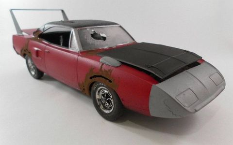 You'd be hard pressed to find a 1970 Plymouth Superbird that hasn't been the subject of a top-down restoration. Findra's model preserves the patina of a barn-find specimen.