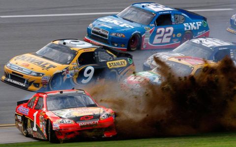 Jamie McMurray slid through the grass to bring out the final caution.