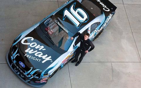 Colin Braun is shown with the No. 16 Con-way Freight Ford Mustang he will drive next year in the Nationwide Series.