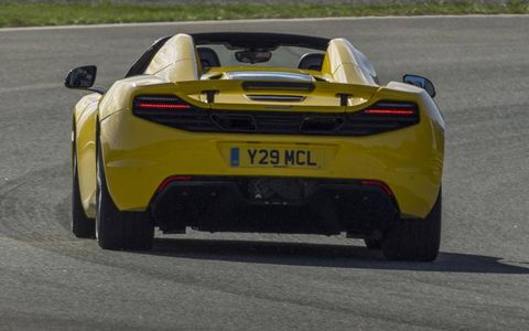 A rear view of the 2013 McLaren 12C Spider.