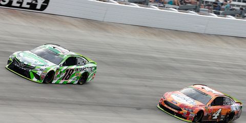 Kyle Busch, left, holds a slim lead over Kevin Harvick heading into the three-race Round of 8.