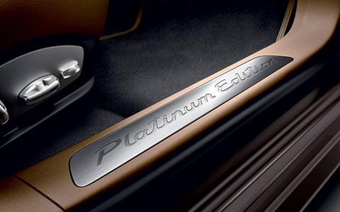 The 2013 Porsche Panamera Platinum Edition has embossed logos in the scuff plates.