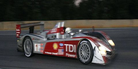 The number 1 Audi R10 P1 car circles the track as the light falls during the Petit Le Mans at Road Atlanta in Braselton, Ga., on Saturday, Oct. 4, 2008.