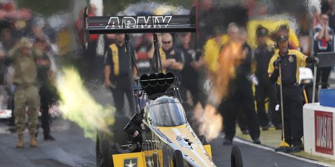 Tony Schumacher piloted his dragster to a 3.736-second pass at 325.45 mph Saturday.