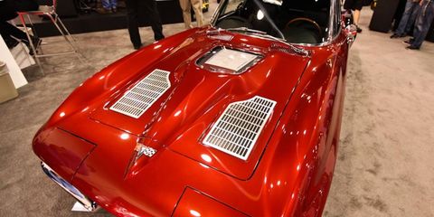 This '63 Corvette doesn't seem so bad until you see the hokey ZR1 window over the LS9 engine. The Sting Ray's lines are too good to foul like this.