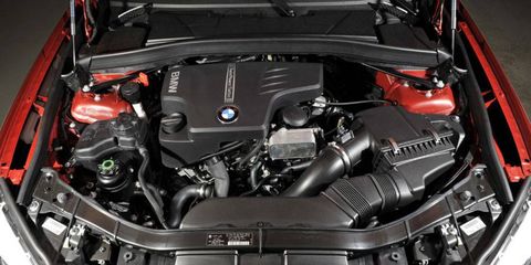 BMW's new turbocharged N20 four-cylinder engine is rated at 240 hp.
