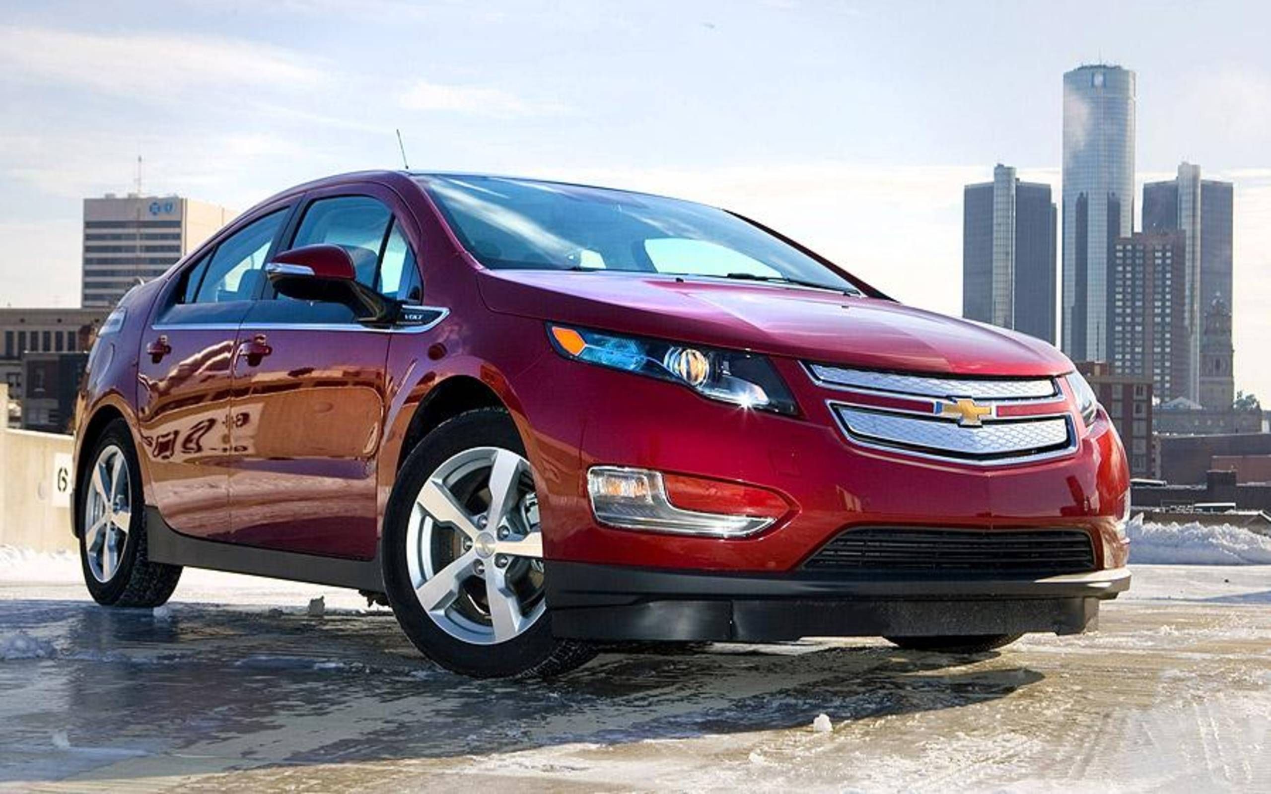 Шевроле московская область. Красный Шевроле вольт 1. Chevrolet Volt красный. Шевроле вольт красный. Бордовый вольт 2 Шевроле.