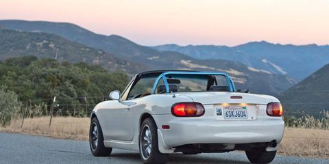 The author painted his roll bar to match his 2000 Miata's blue stripe.