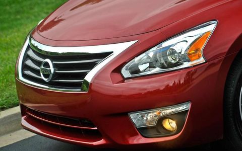 Front grille detail of the Nissan Altima shows Infiniti influence.