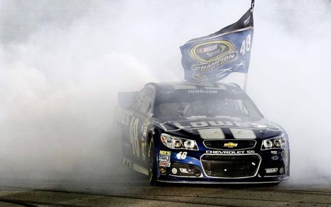 Jimmie Johnson celebrates his sixth NASCAR Sprint Cup Series title in eight years.
