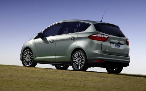 The 2013 Ford C-Max Energi gets Ford's automatic tailgate, which is actuated with a waive of a foot.