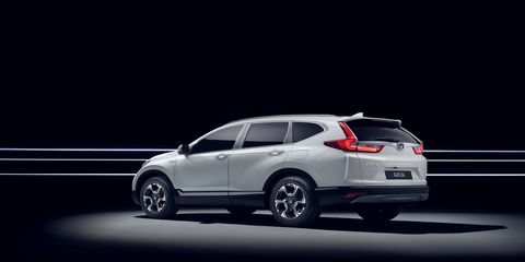 If we hadn't told you this Honda CR-V was a hybrid, would you have known? Stealth seems to be part of the electrified crossover's game plan.