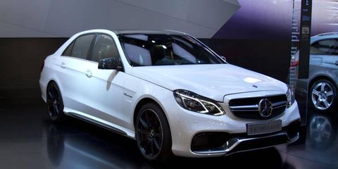 Front 3/4 view of the 2014 Mercedes-Benz E63 AMG.