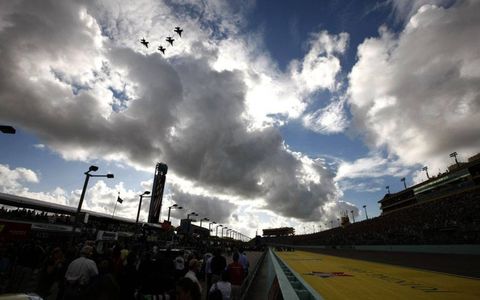Four F-16 fighter jets fly over during the prerace festivities for the NASCAR Sprint Cup season finale at Homestead-Miami Speedway on Nov. 20. Photo by: Michael L. Levitt/LAT Photographic