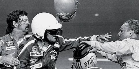 Bobby Allison, left, takes on rival Cale Yarborough after the 1979 Daytona 500.