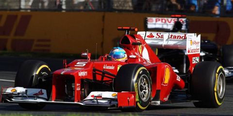 Fernando Alonso charged from 12th to fifth to save the weekend for Ferrari.