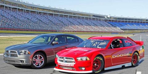 Dodge showed off its 2013 NASCAR Charger, right, at Las Vegas on Sunday. At left is the showroom model.
