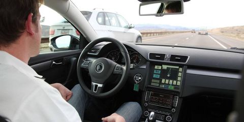 A Continental engineer tests the company's new semiautonomous car on the open road.