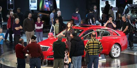 Attendees check out the new Cadillac ATS at this year's Detroit auto show.